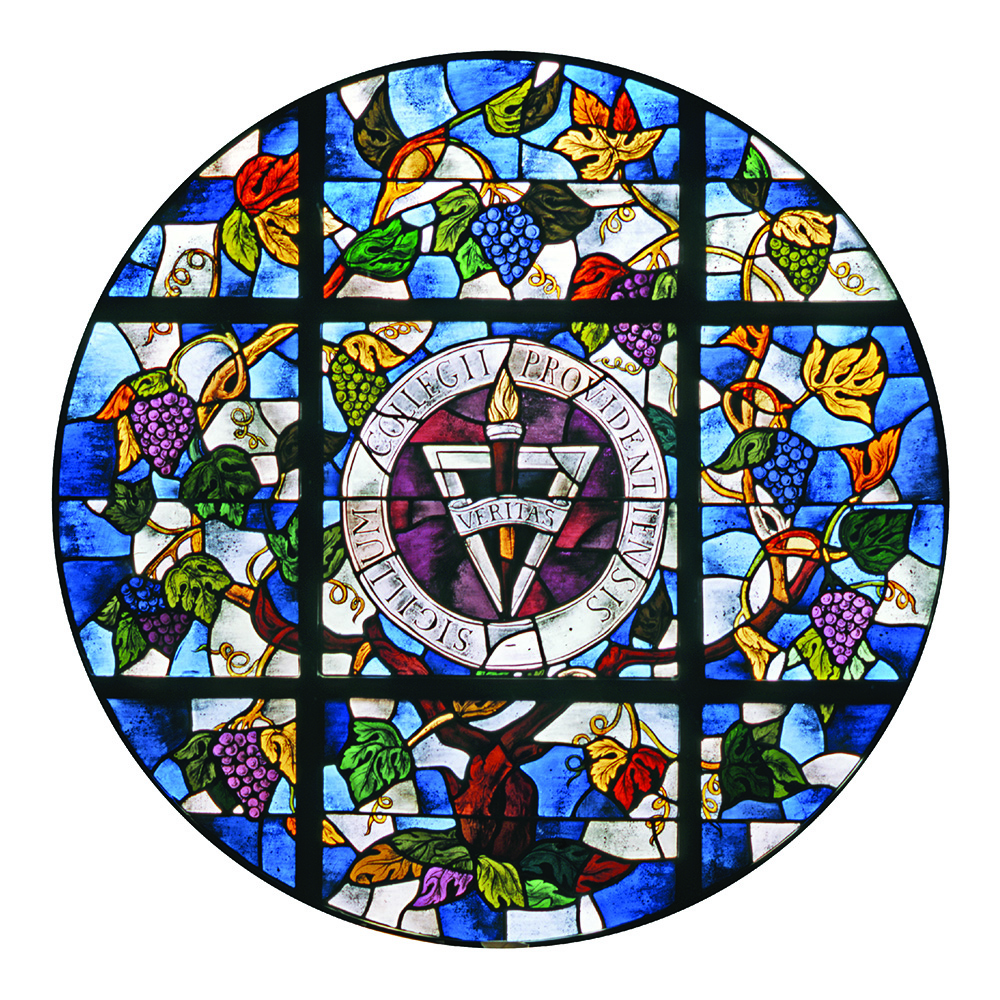 graphic of stained glass window with providence college seal in the middle